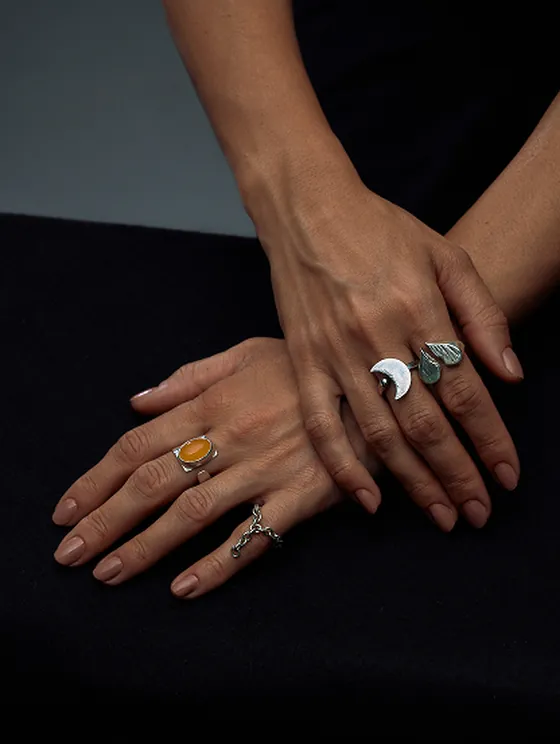 Model wearing handcrafted Indigo silver jewelry from the nomadic Rhythm tale