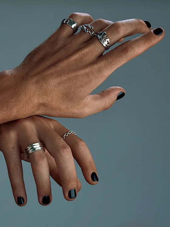 Model wearing handcrafted Indigo silver jewelry from the sacred Pulse tale