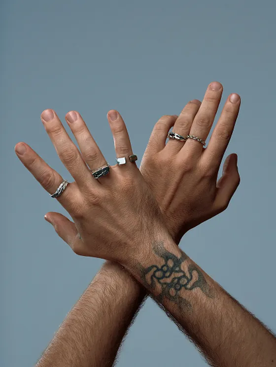 Model wearing handcrafted Indigo silver jewelry from the deep Resonance tale