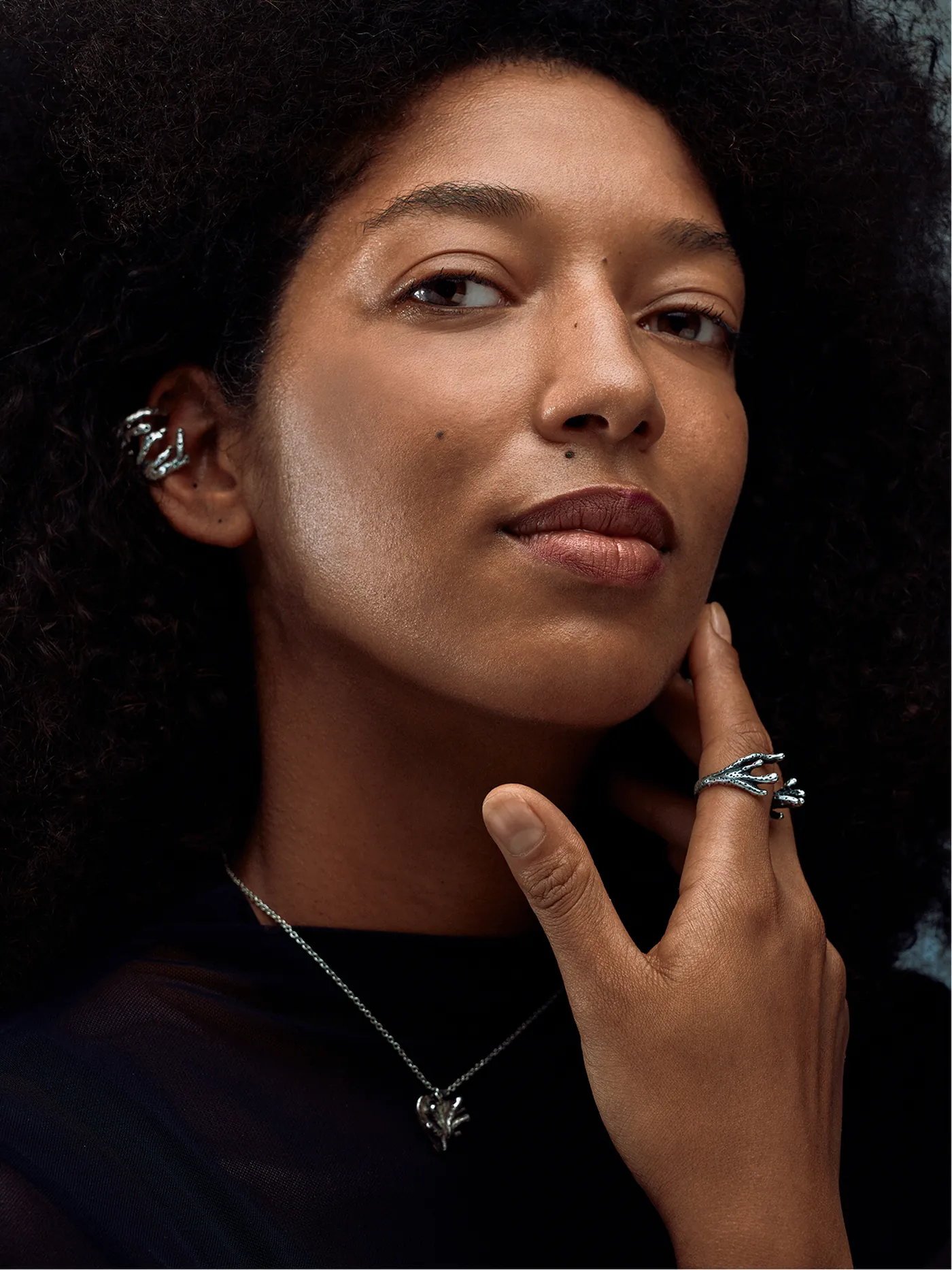 Indigo Undertow silver ring styled in the Sub-noise current editorial